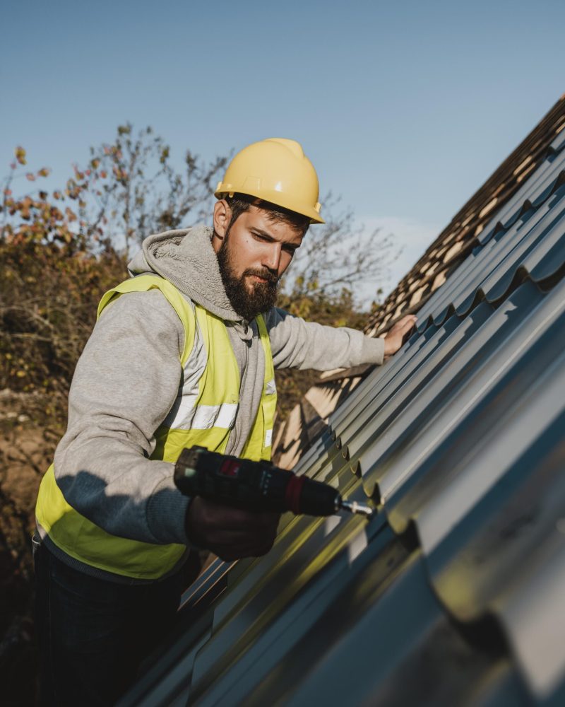 man-working-roof-with-drill